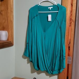 Wrap blouse with bell sleeves